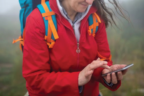 hiker on phone