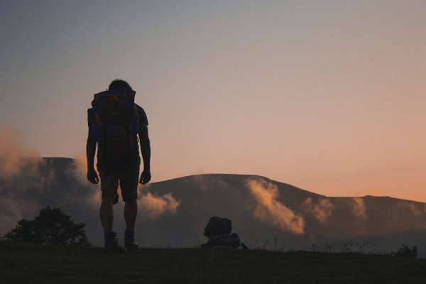 Man Hiking in the Evening Man Hiking in the Evening