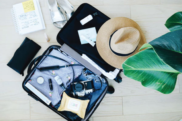 Suitcase packed for budget travel Suitcase packed for budget travel
